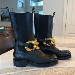 Elegant Black Boots with Gold Chain Detail
